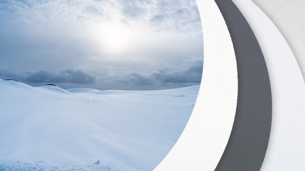 thumbnail for Modernist Crescent Quartz Collection featuring an image of a calm, snowy tundra